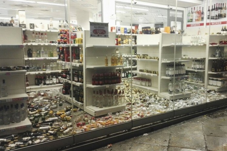 epa06100497 Fallen bottles are seen in a liquor store following an earthquake on the island of Kos, Greece, 21 July 2017. Two earthquake-related fatalities were reported on the island of Kos in the early morning hours of 21 July, while several others were injured from a strong 6.7 magnitude earthquake that shook the island and much of the southeast Aegean region and southwestern Turkey.  EPA/GIANNIS KIARIS -- BEST QUALITY AVAILABLE