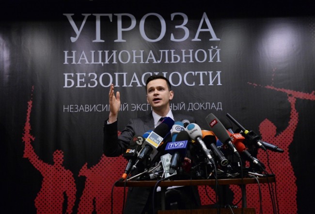 Илья Яшин на презентации доклада "Угроза национальной безопасности". Фото Sputnik/Scanpix