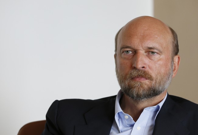 Sergei Pugachev, a tycoon once dubbed "Putin's banker", attends an interview with Reuters in Paris, France, September 22, 2015. Pugachev said on Tuesday that his lawyers have drawn up a plan to freeze Russian assets abroad if the Kremlin failed to reach a compromise over his claim for $12 billion.  REUTERS/John Schults