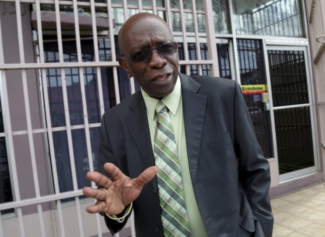 Trinidad and Tobago's former National Security Minister and former FIFA Vice President, Jack Warner, gestures in Arouca, East Trinidad, in this May 27, 2015 file photo. Former CONCACAF president and FIFA executive committee member Warner has been banned from all football-related activities for life, the ethics committee for world soccer body FIFA said on September 29, 2015. Warner was found to have committed "many and various acts of misconduct continuously and repeatedly during his time as an official in different high-ranking and influential positions at FIFA and CONCACAF," the committee said in a statement. REUTERS/Andrea De Silva/Files
