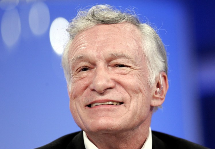 FILE PHOTO -  Playboy founder Hugh Hefner smiles as he addresses questions at the panel for E! networks television show "The Girls Next Door" at the Television Critic's Association Summer press tour at the Beverly Hilton Hotel in Beverly Hills July 17, 2005. REUTERS/Mario Anzuoni/File Photo