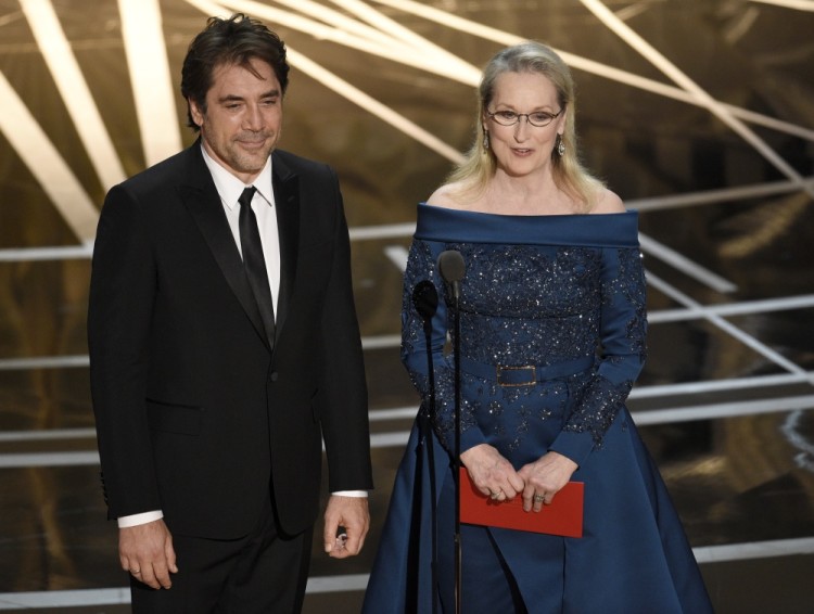 Javier Bardem, left, and Meryl Streep present the award for best cinematography at the Oscars on Sunday, Feb. 26, 2017, at the Dolby Theatre in Los Angeles. (Photo by Chris Pizzello/Invision/AP)