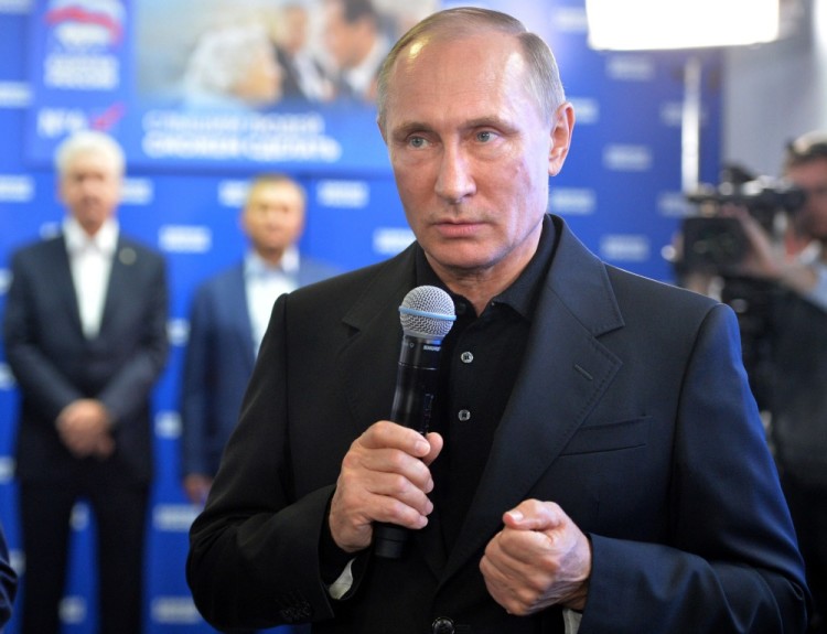Владимир Путин в штабе "Единой России" после выборов в Госдуму. Фото AFP PHOTO / SPUTNIK /Scanpix