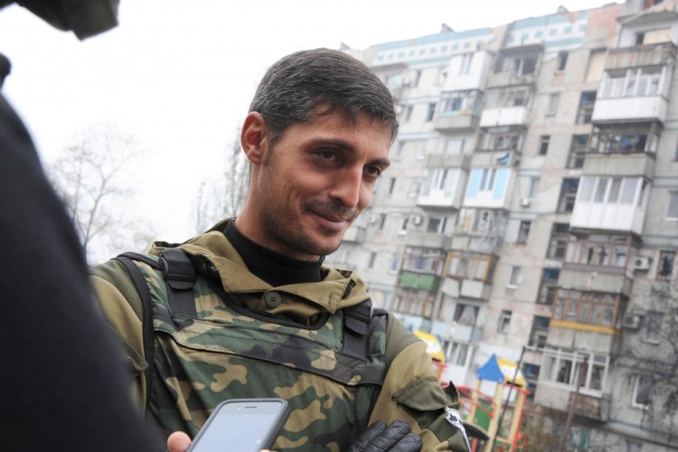 (FILES) This file photo taken on October 16, 2014 shows Givi, commander of the pro-Russian separatist Somali battalion, speaking to reporters from their lookout centre near Donetsk's Sergey Prokofiev international airport. The military chief of a self-proclaimed Russian-backed republic in eastern Ukraine was killed in an "act of terror" on February 8, the latest victim of a string of similar attacks, local authorities said. The dead man was Mikhail Tolstykh, head of the notorious "Somali" battalion and a leading commander of the self-declared Donetsk People's Republic, the rebels' spokesman told AFP. / AFP PHOTO / Dominique FAGET