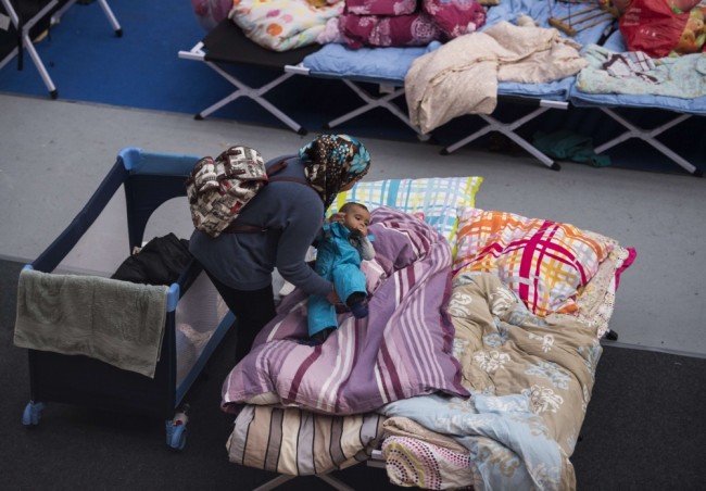 В центре для временного размещений мигрантов в Берлине. Фото AFP/Scanpix