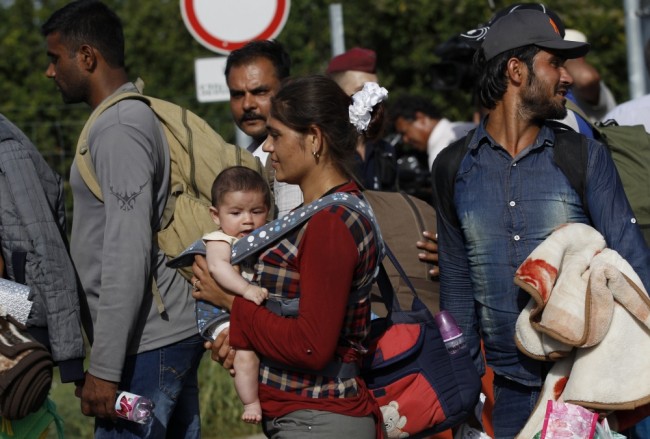 Беженцы в Венгрии. Фото AP/Scanpix