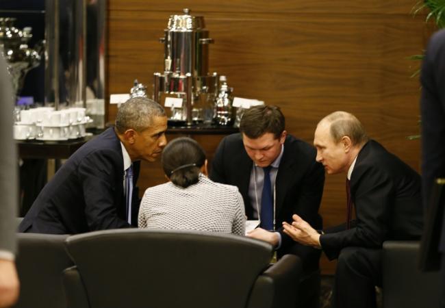Кулуарные переговоры Владимира Путина и Барака Обамы. Фото AFP/Scanpix