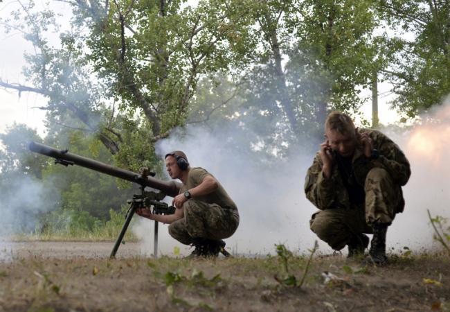 Украинские военные на позиции в Авдеевке. Фото AFP/Scanpix