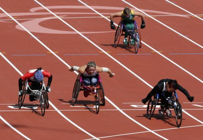 Соревнования паралимпийцев на колясках в классе T34 на Олимпиаде в Лондоне. Фото: AFP / Scanpix