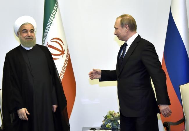 Владимир Путин и президент Ирана Хасан Рухани. Фото AP/Scanpix