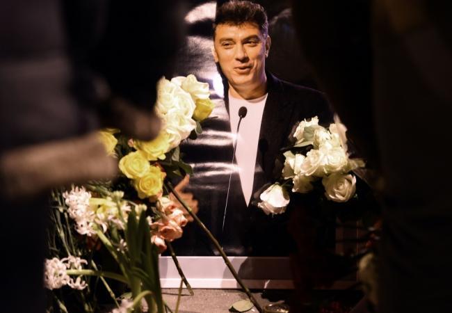 Фото Бориса Немцова на одном из траурных мероприятий в Москве. Фото AFP/Scanpix