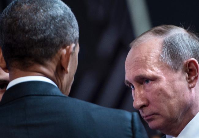 Встреча Барака Обамы и Владимира Путина на саммите в АТЭС, по свидетельству очевидцев, продлилась всего несколько минут. Фото: AFP / Scanpix