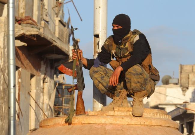 Боевик «Джебхат ан-Нусры», входящей в «Армию завоевания». Фото: Reuters / Scanpix