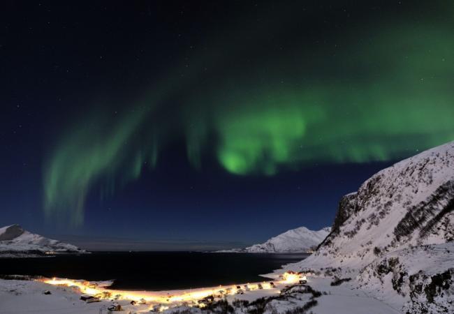 Северное сияние над снегами Норвегии. Фото: AP / Scanpix