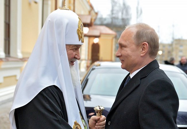 Фото: AFP/Scanpix. Патриарх Московский и всея Руси Кирилл (слева) и президент России Владимир Путин
