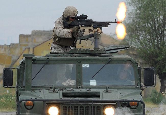 Американский морской пехотинец принимает участие в учениях Agile Spirit. Фото AFP/Scanpix