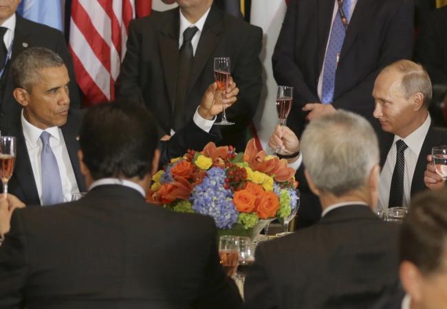 На встрече Барака Обамы и Владимира Путина. Фото Reuters/Scanpix