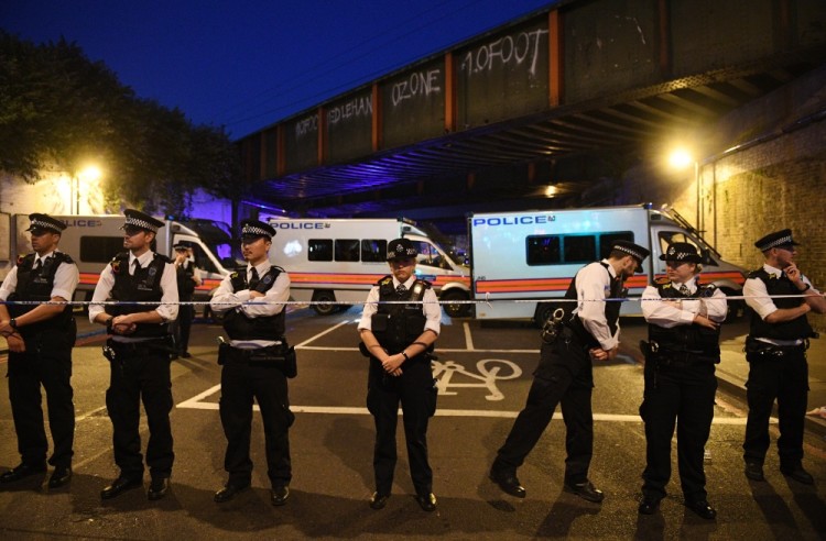 epaselect epa06036537 Policemen stand by a police cordon near Finsbury Park, after a van collision incident in north London, Britain, 19 June 2017. According to the Metropolitan Police Service, police responded on 19 June, to reports of a major incident where a vehicle collided with pedestrians in Seven Sisters Road, in north London. One man was pronounced dead at the scene and at least eight people were injured, police said. The driver of the van, a 48-year-old man, has been detained. An investigation into the circumstances of the incident is being carried out by the Counter Terrorism Command. The Muslim Council of Britain (MCB) commented on the incident saying that a van has run over worshippers outside the Muslim Welfare House (MWH), near the Finsbury Park Mosque. British Prime Minister Theresa May described the attack as a 'terrible incident.'  EPA/FACUNDO ARRIZABALAGA