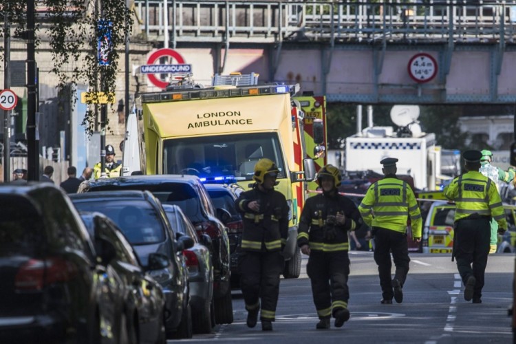 epa06205789 Emergency services gather close to the 'Parsons Green' Underground Station in London, Britain, 15 September 2017. Emergency services have responded to reports of an explosion on an underground tube train.  EPA/WILL OLIVER