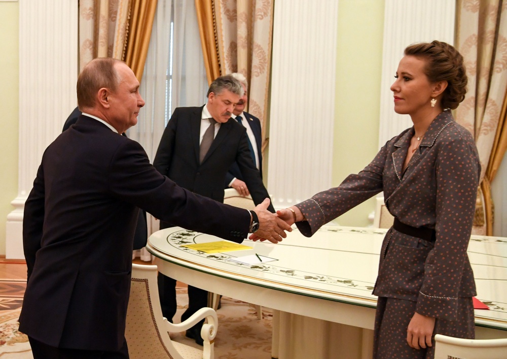 Ксения Собчак на встрече с Владимиром Путиным. Фото AFP PHOTO / Scanpix/ LETA