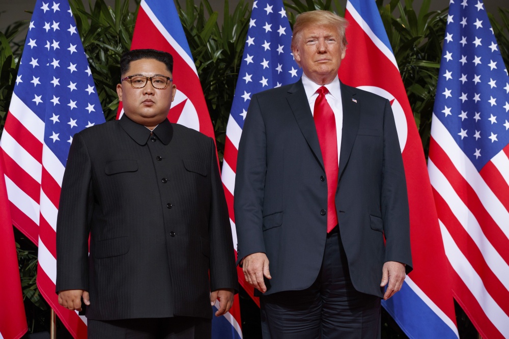 Ким Чен Ын и Дональд Трамп. Фото AP Photo/Scanpix/LETA