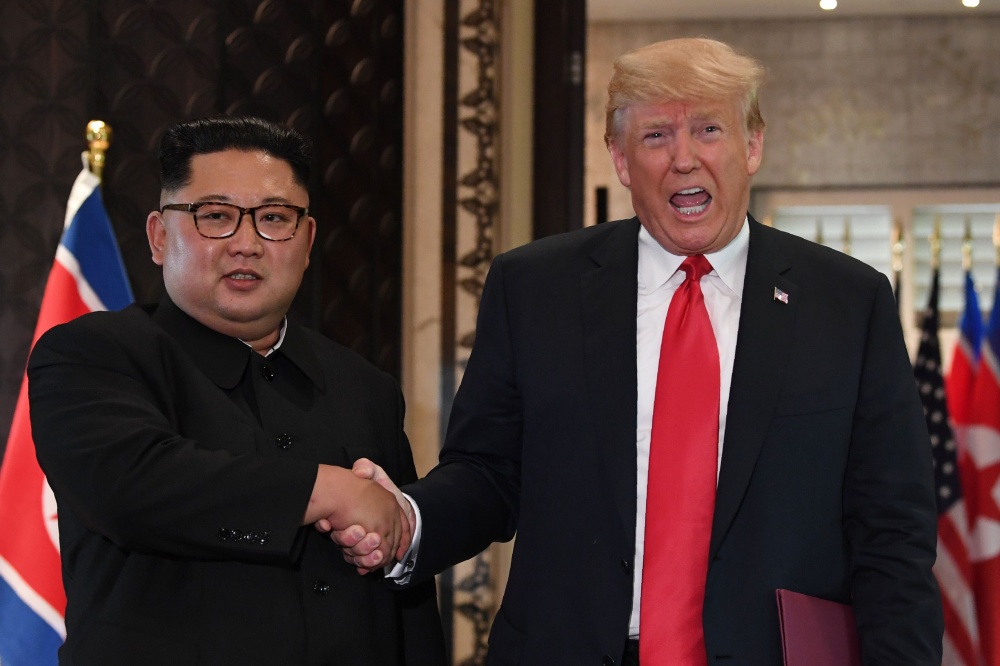 Дональд Трамп и Ким Чен Ын. Фото AFP/Scanpix/LETA

