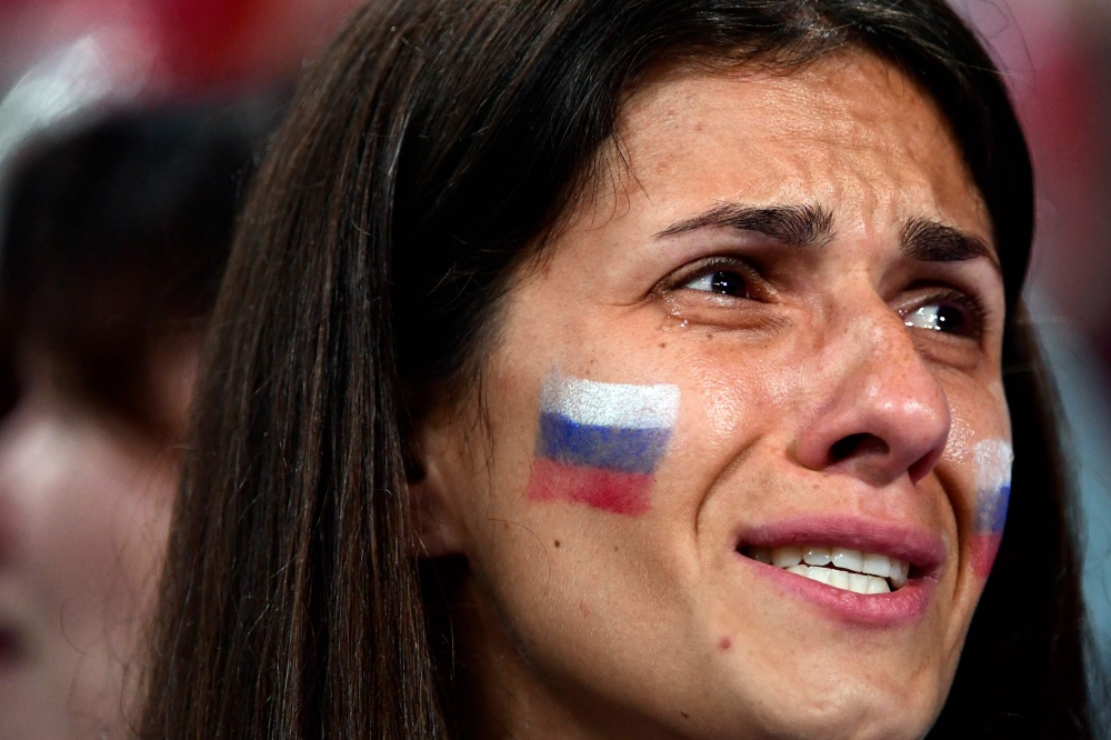 Болелщица на трибунах после матча Россия - Хорватия. Фото AFP/Scanpix/Leta