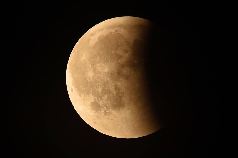 Лунное затмение 28 июля 2018 года. Фото AFP/Scanpix/Leta