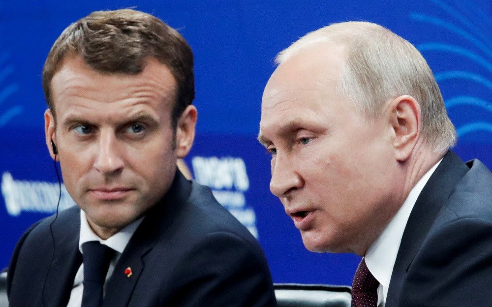 Президент Франции Макрон и президент России Путин на Международном экономическом форуме в Санкт-Петербурге. Фото REUTERS/Scanpix/Leta