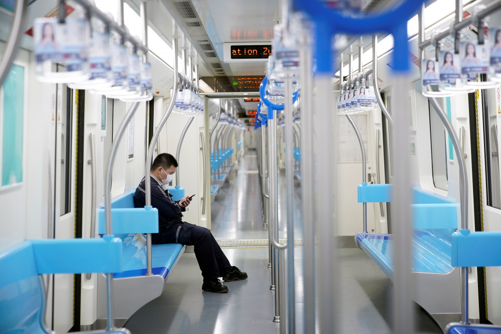 Пассажир метро в Шанхае. Фото: ALY SONG / TASS / Scanpix / Leta