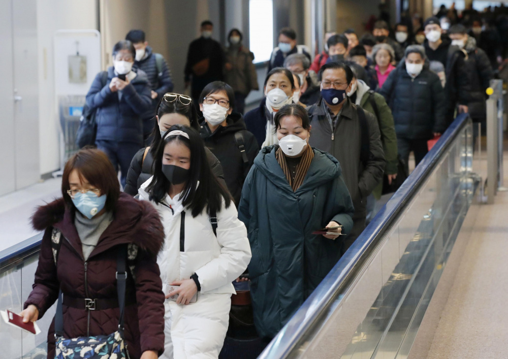 Пассажиры аэропорта, прибывшие из Ухани в Японию. Фото: REUTERS / TASS / Scanpix / Leta