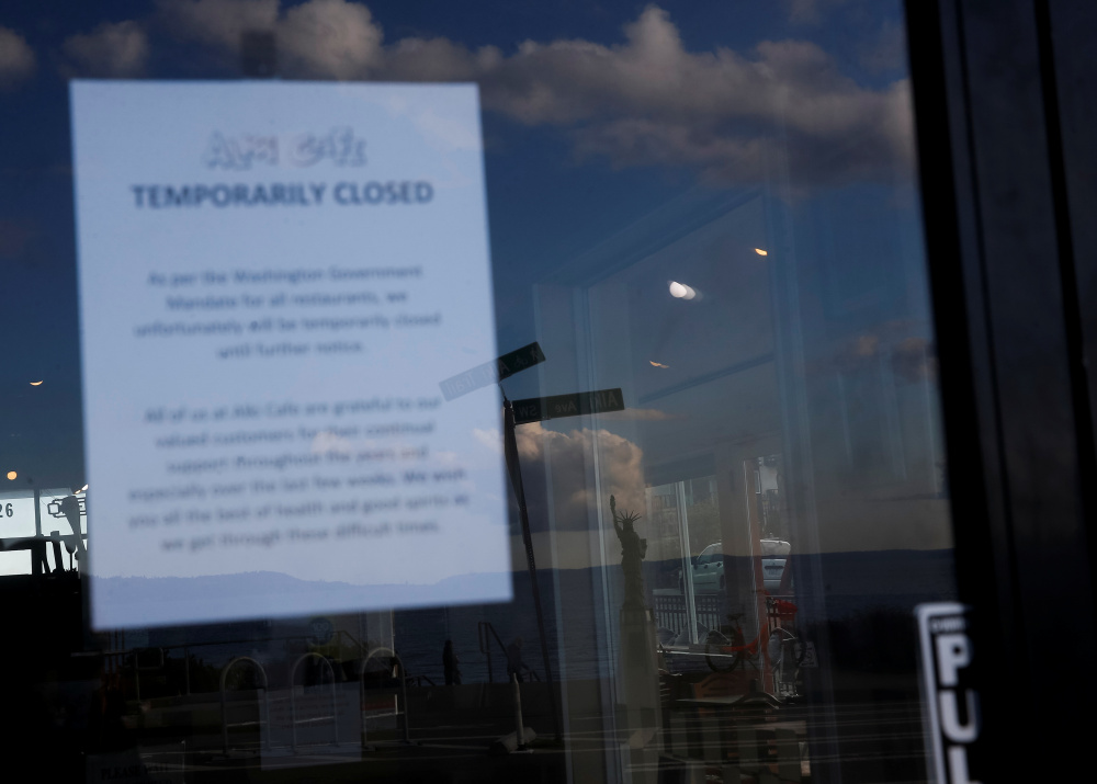 Объявление о закрытии магазина в Сиэтле. Фото REUTERS/Lindsey Wasson/Scanpix/LETA