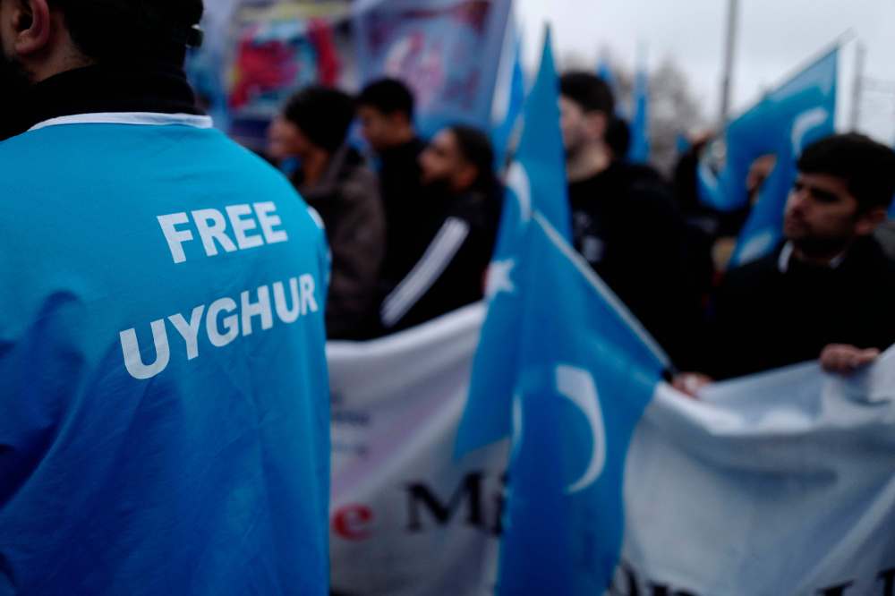 Акция в поддержку уйгуров в Берлине. Фото: JOHN MACDOUGALL / TASS / Scanpix / Leta