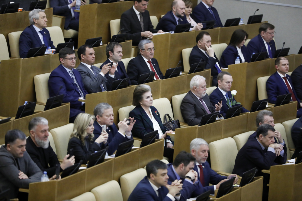 Депутаты Госдумы слушают Владимира Путина. Фото AP Photo/Pavel Golovkin/Scanpix/LETA