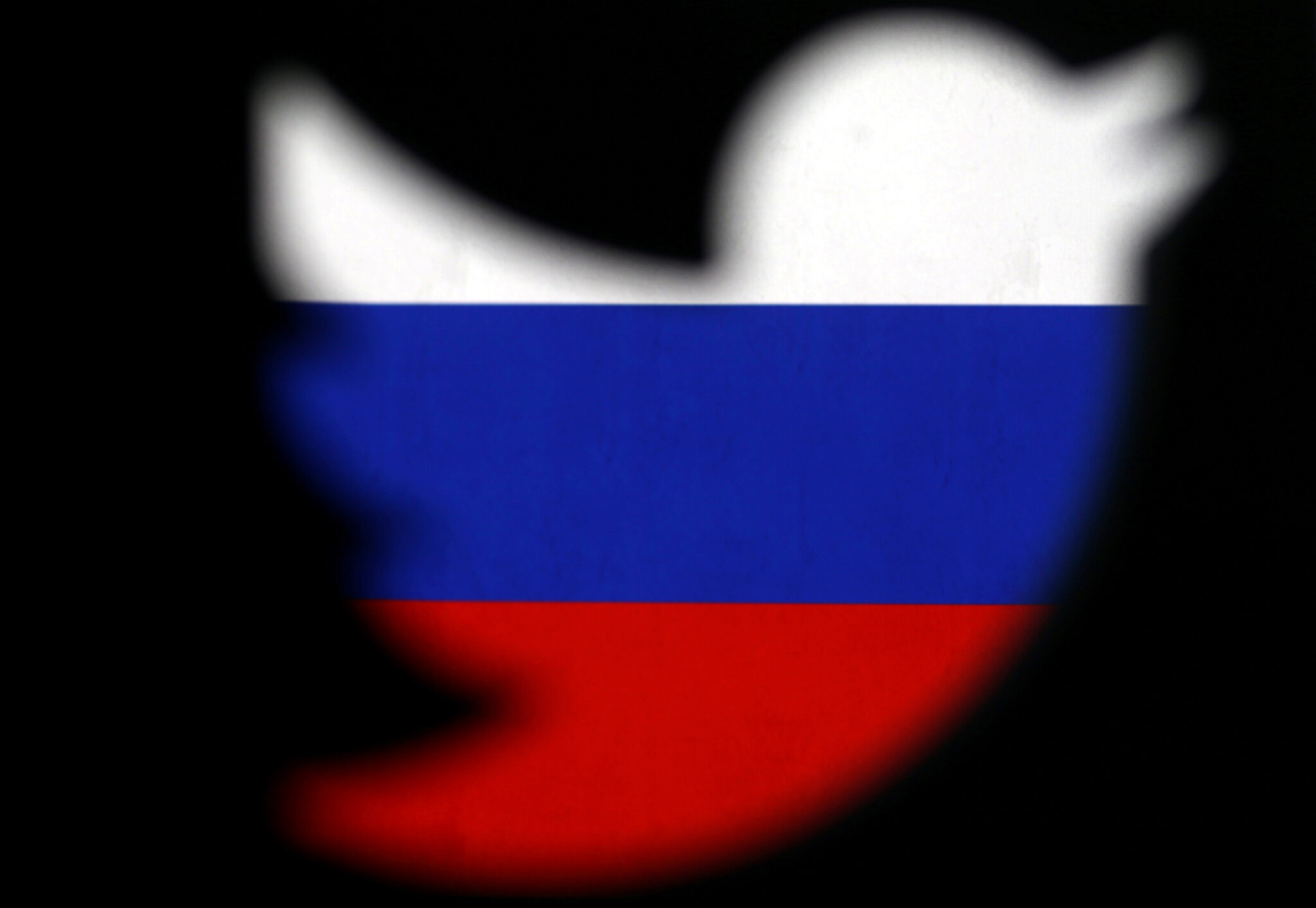 Лого Twitter на фоне флага России. Фото REUTERS/Dado Ruvic/Illustration/File Photo/Scanpix/Leta