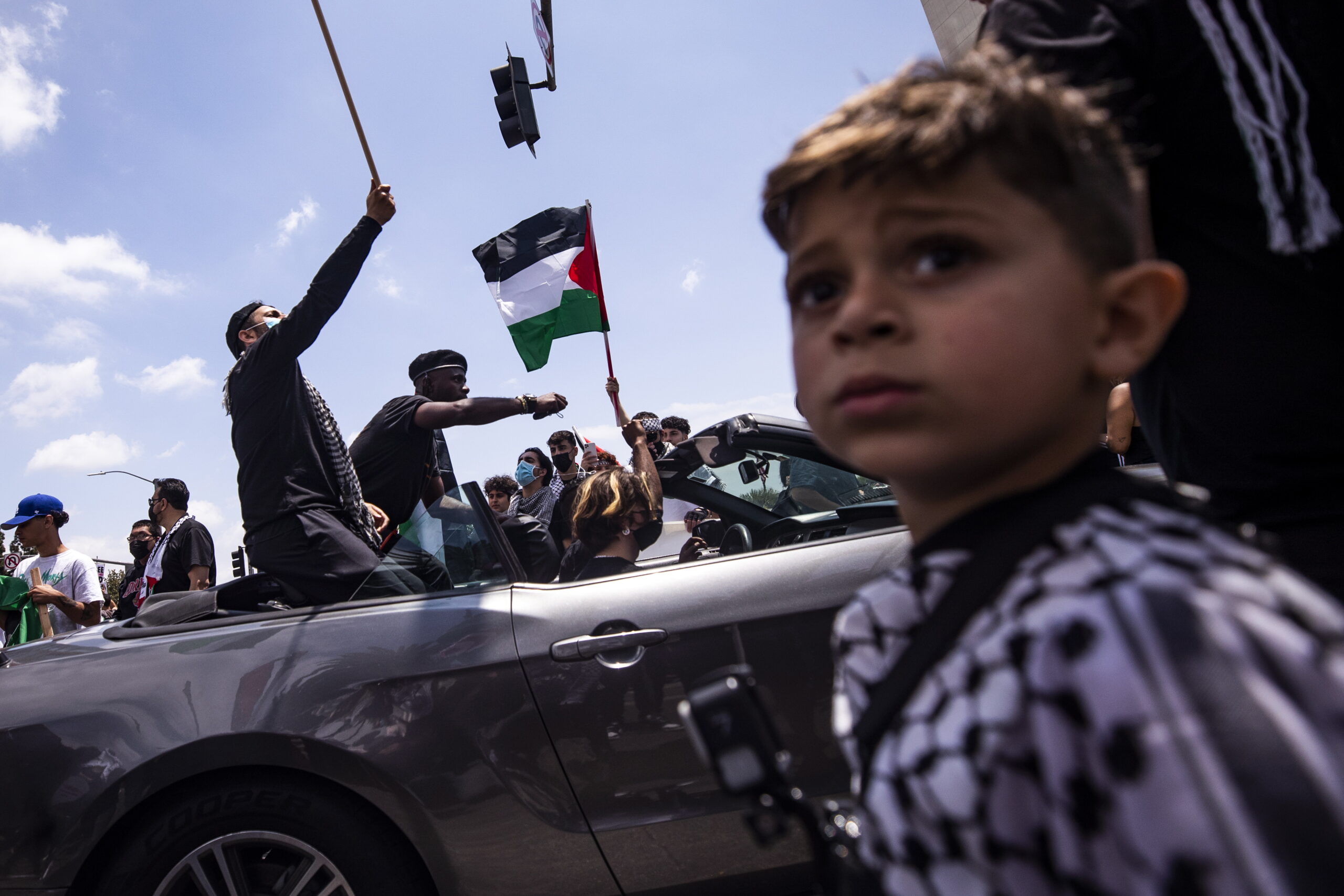 Ребенок на акции в поддержку Палестины в Лос-Анджелесе. Фото  EPA/ETIENNE LAURENT/Scanpix/Leta