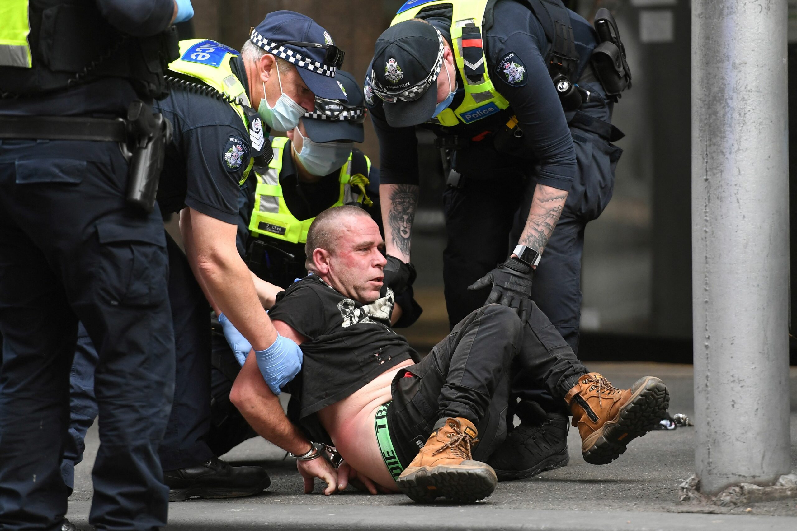 Задержание в Мельбурне. Фото  William WEST / AFP/Scanpix/Leta