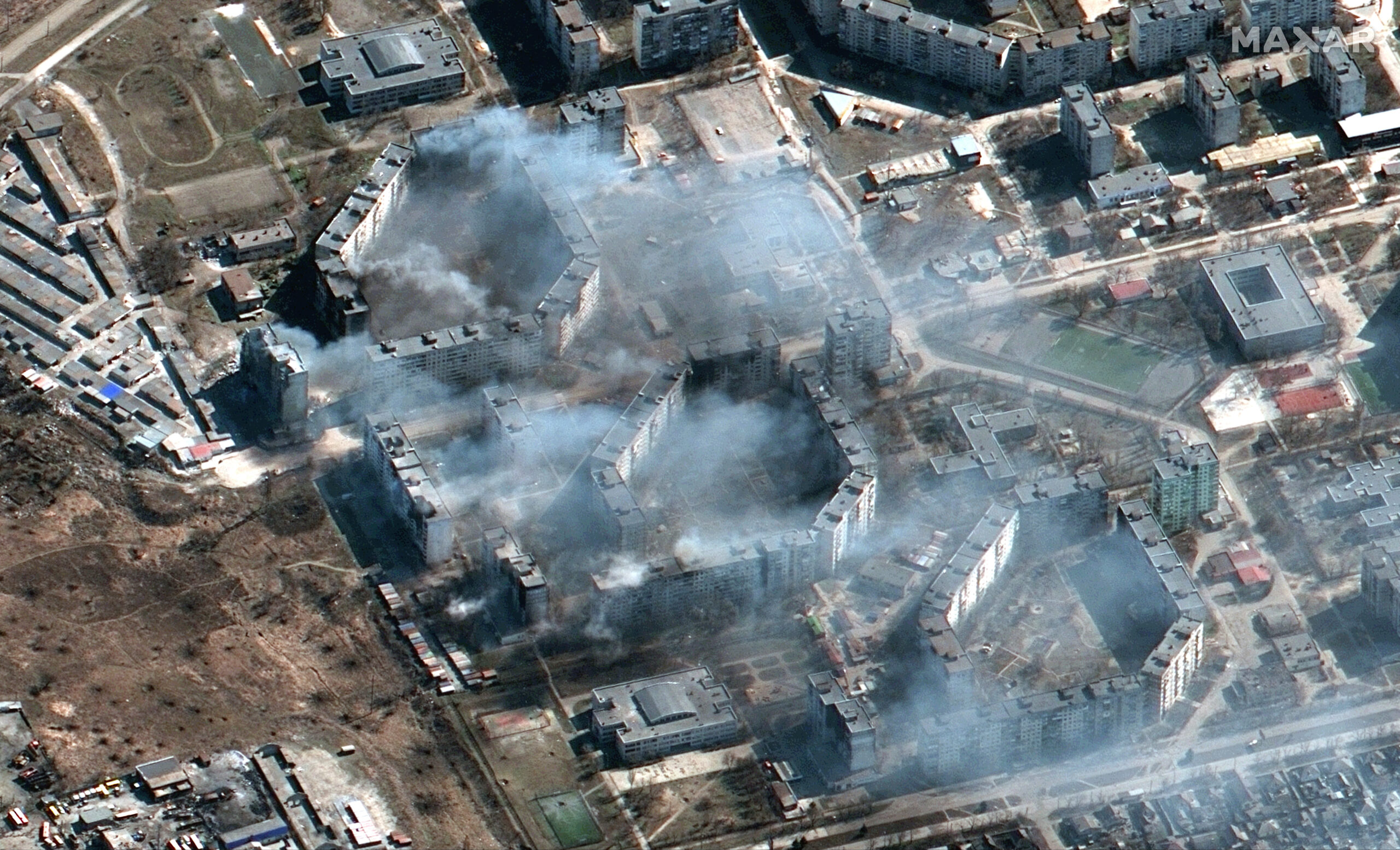Вид на горящие жилые кварталы на северо-востоке Мариуполя. Украина, 19 марта 2022 года. © Satellite image ©2022 Maxar Technologies via AP / Scanpix / Leta