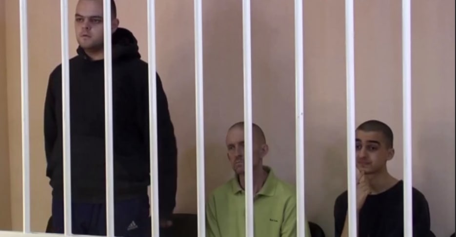 Иностранцы, воевавшие в Украине в суде самопровозглашенной «ДНР». Скриншот в видео «Коммерсанта».
