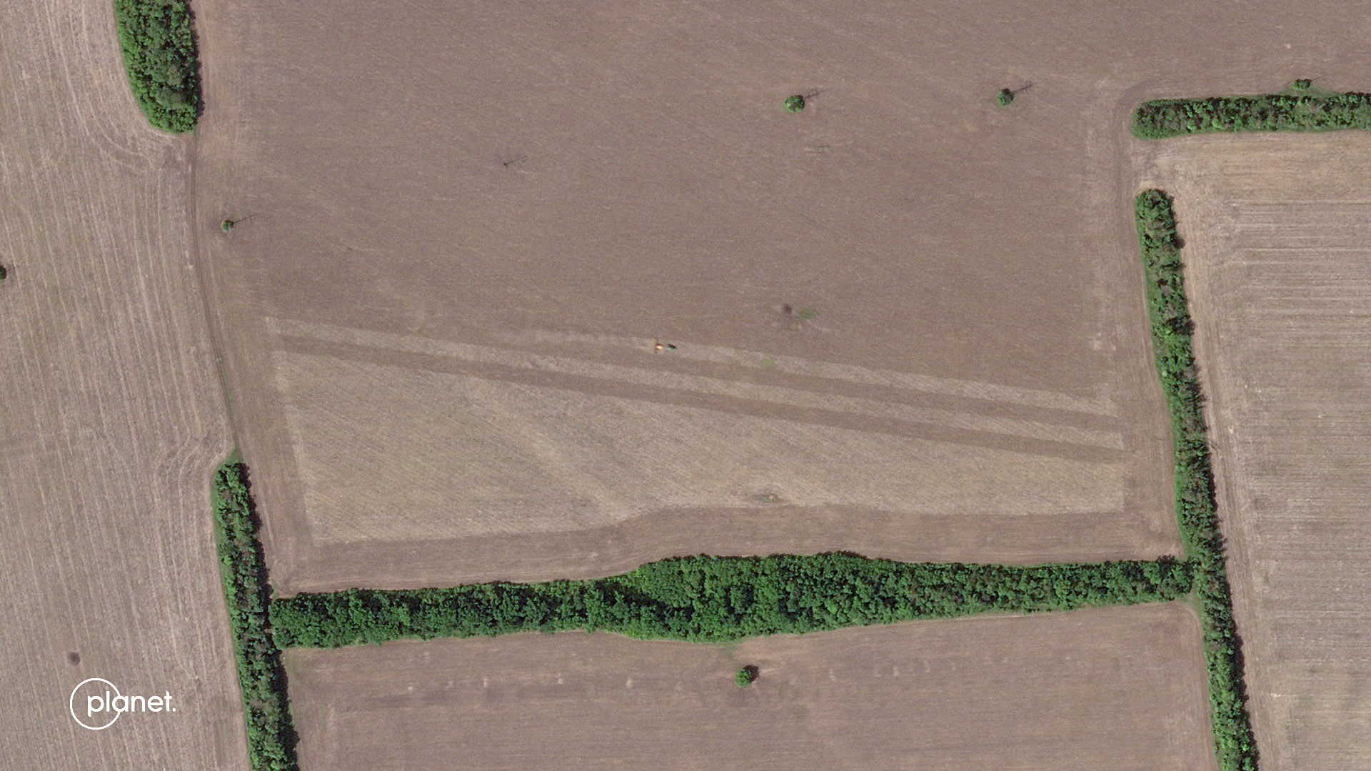 Спутниковый снимок поля возле Славянска. Фото AFP PHOTO /HO/Planet Labs PBC/Scanpix/Leta.