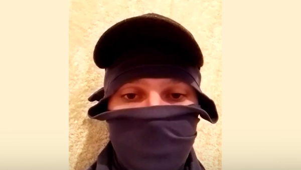 Человек, рассказавший об изнасиловании украинок "польскими наемниками" в Николаеве. Кадр видео РИА Новости