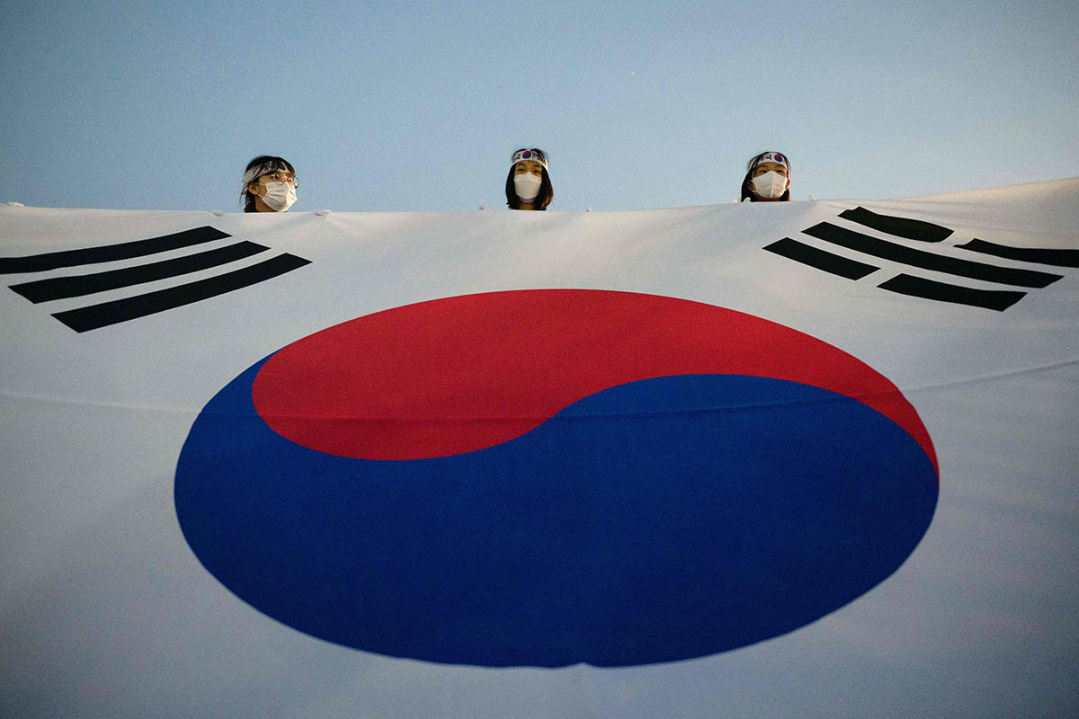 Флаг Южной Кореи. Фото ANTHONY WALLACE/AFP/Scanpix/Leta