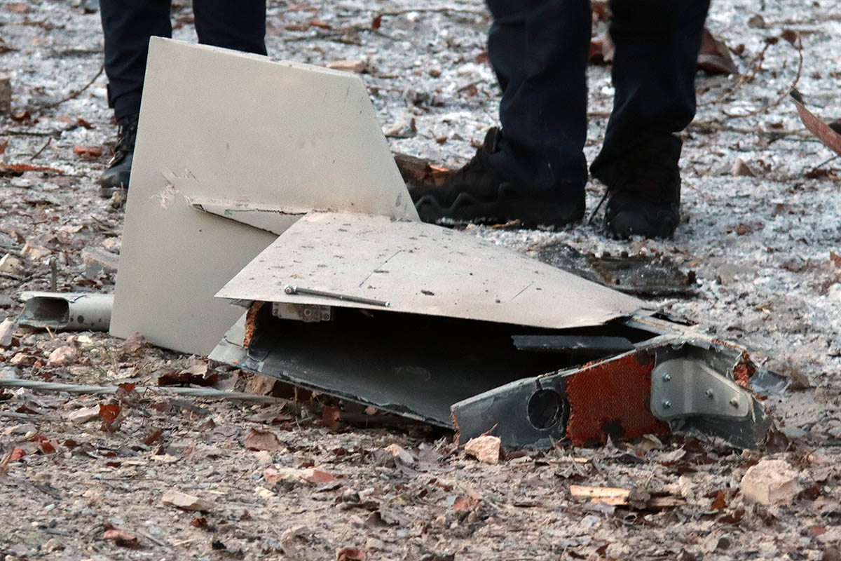 KYIV, UKRAINE - DECEMBER 14, 2022 - A fragment of a kamikaze drone are seen on the ground in the Shevchenkivskyi district of Kyiv, capital of Ukraine. On Wednesday morning, Russian invaders launched 13 Shahed kamikaze drones at Ukraine, all of which were shot down by the Ukrainian Air Defence Forces, according to preliminary reports.