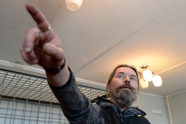 2352067 01/24/2014 Sergei “Pauk” Troitsky, the leader of the punk metal group Korrozia Metalla, at the Novosibirsk Region's Obskoy Court, shortly before a hearing to qualify his actions at the Tolmachovo international airport and to determine potential pretrial restrictions. The musician engaged in a conflict with the airline over bottled liquids found in his carry-on luggage during a personal check. Alexandr Kryazhev/RIA Novosti