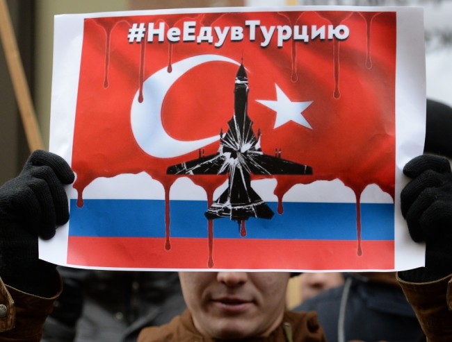  Протестующий около посольства Турции в Москве. Фото Sputnik/Scanpix