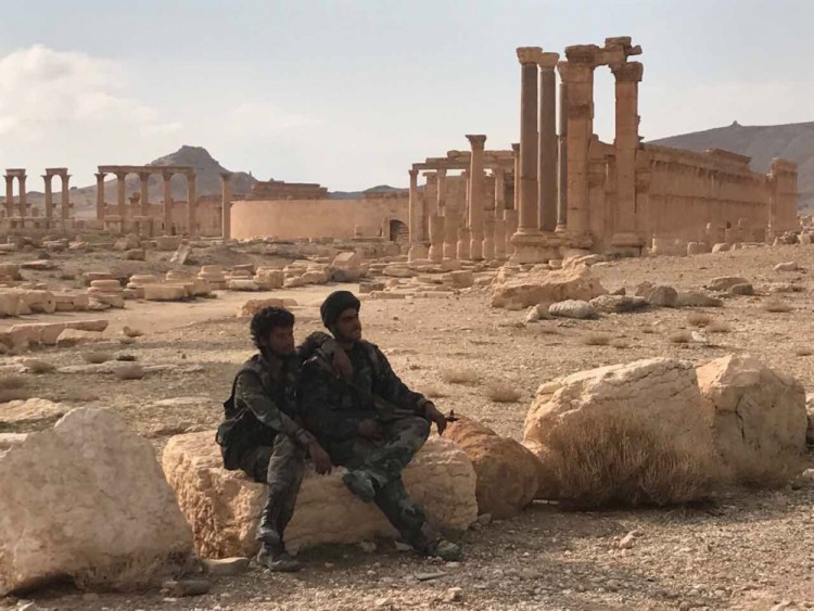 3041820 03/02/2017 Syrian soldiers are seen here near the historical architectural complex of the ancient city of Palmyra in Homs Governorate, Syria. Palmyra was captured by the army of the Syrian Arab Republic with a support from the Russian Air Force. Maximum quality available. Михаил Алаеддин/Sputnik