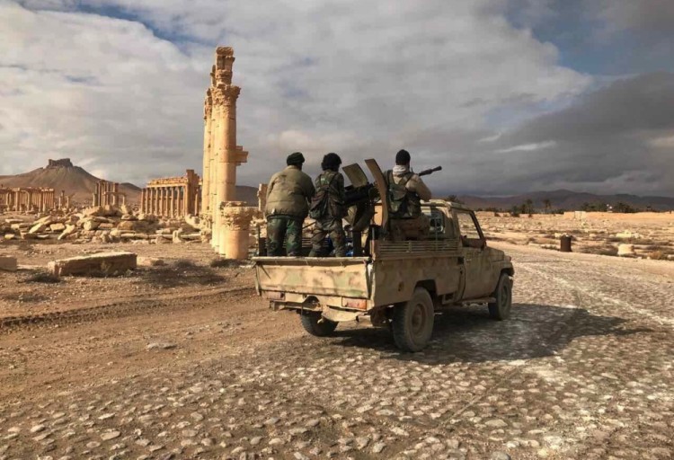 3041821 03/02/2017 Syrian soldiers are seen here near the historical architectural complex of the ancient city of Palmyra in Homs Governorate, Syria. Palmyra was captured by the army of the Syrian Arab Republic with a support from the Russian Air Force. Maximum quality available. Михаил Алаеддин/Sputnik