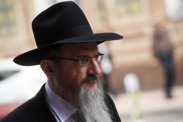 3149581 07/11/2017 Moscow, Russia. Russia's Chief Rabbi Berl Lazar near the Central House of Writers where people are paying their last respects to blogger Anton Nosik. Iliya Pitalev/Sputnik