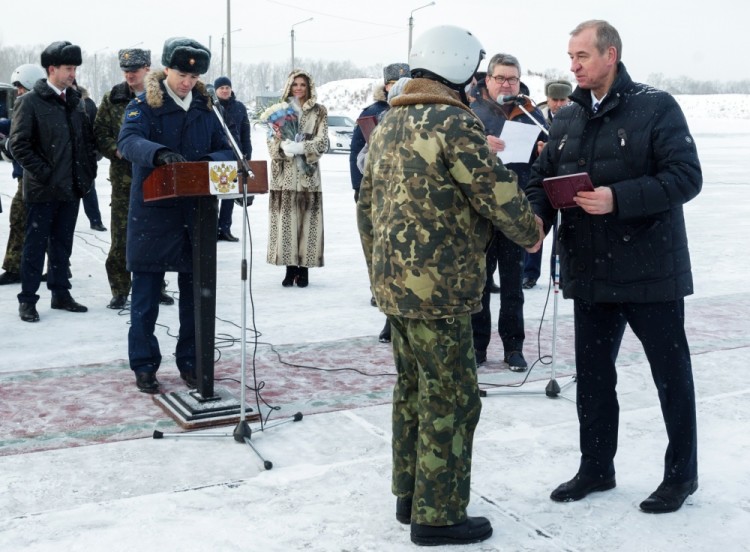 3256642 12/13/2017 Governor of the Irkutsk Region Sergei Levchenko, right, awards the medal 