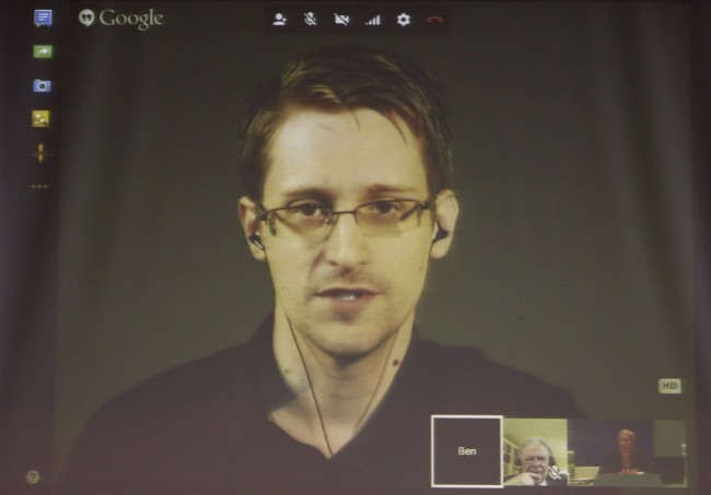 Former U.S. National Security Agency contractor Edward Snowden appears live via video during a meeting about whistle blowers at the Council of Europe in Strasbourg, France, June 23, 2015.   REUTERS/Vincent Kessler